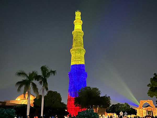Qutub Minar lit up in Colombia's national flag