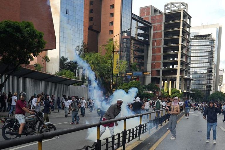 Anti-Maduro protests spread as Venezuelan opposition claims victory ...