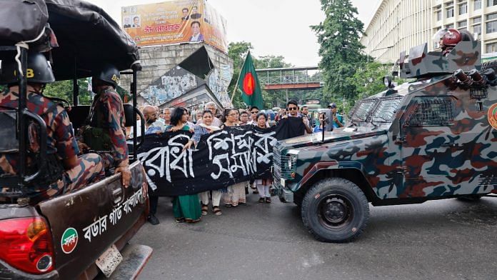 University of Dhaka faculty march towards Shahbagh police station after arrest of students, on 17 July 2024 | Reuters/Mohammad Ponir Hossain