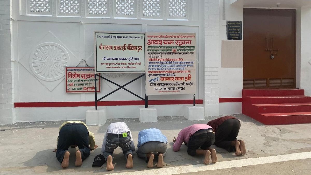 Followers of Bhole Baba prostrating outside his ashram in Bahadur Nagar | Shikha Salaria | ThePrint