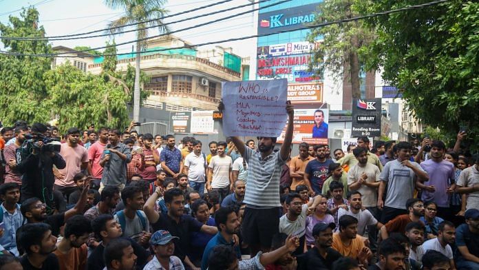 Students protesting in Old Rajinder Nagar after three students died on Saturday | Suraj Singh Bisht, ThePrint