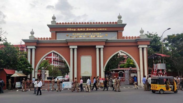 Security personnel keep guard outside Madras High Court | Photo: ANI