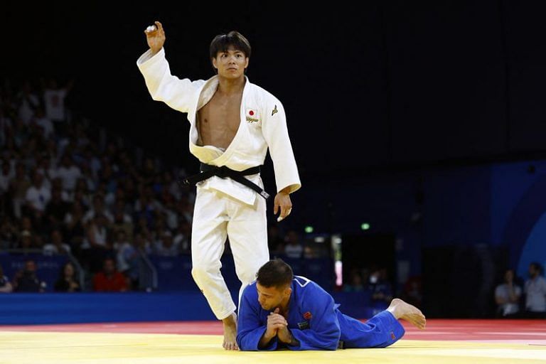 OlympicsJudoAbe retains title, Keldiyorova brings first gold for