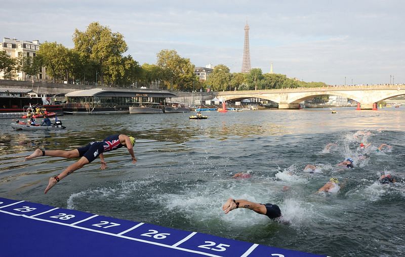 OlympicsTriathlonSwimming training session cancelled after rain lifts