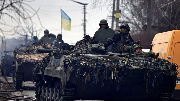 Ukrainian soldiers are pictured in their tanks, amid Russia's invasion on Ukraine, in Bucha, in Kyiv region, Ukraine April 2, 2022 | Reuters file photo