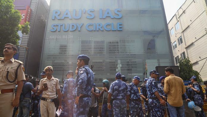 Police deployment outside Rau's IAS Study Circle in Old Rajinder Nagar, Sunday | Suraj Singh Bisht | ThePrint