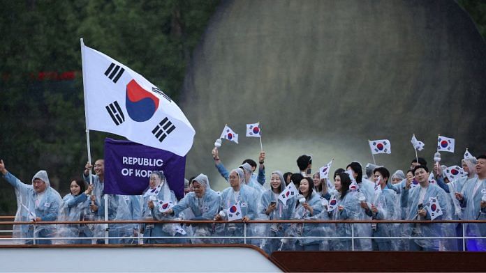 South Korean athletes participate in the floating parade on the river Seine during the opening ceremony | Reuters