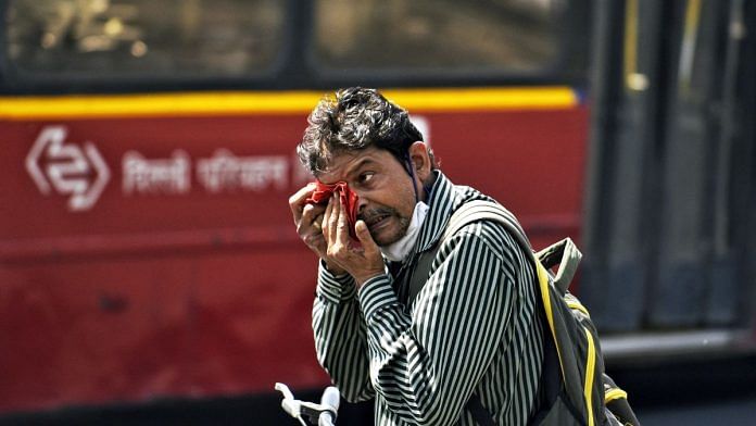 A man wipes sweat on his face during the heatwave in New Delhi on Monday | Representational image | ANI