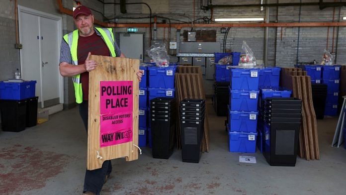 A worker prepares to deliver election ballot boxes in Edinburgh, Scotland, Britain July 3, 2024 | Reuters