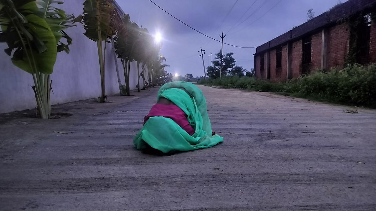 A devotee cries outside the Mainpuri Ashram | Shubhangi Misra | ThePrint