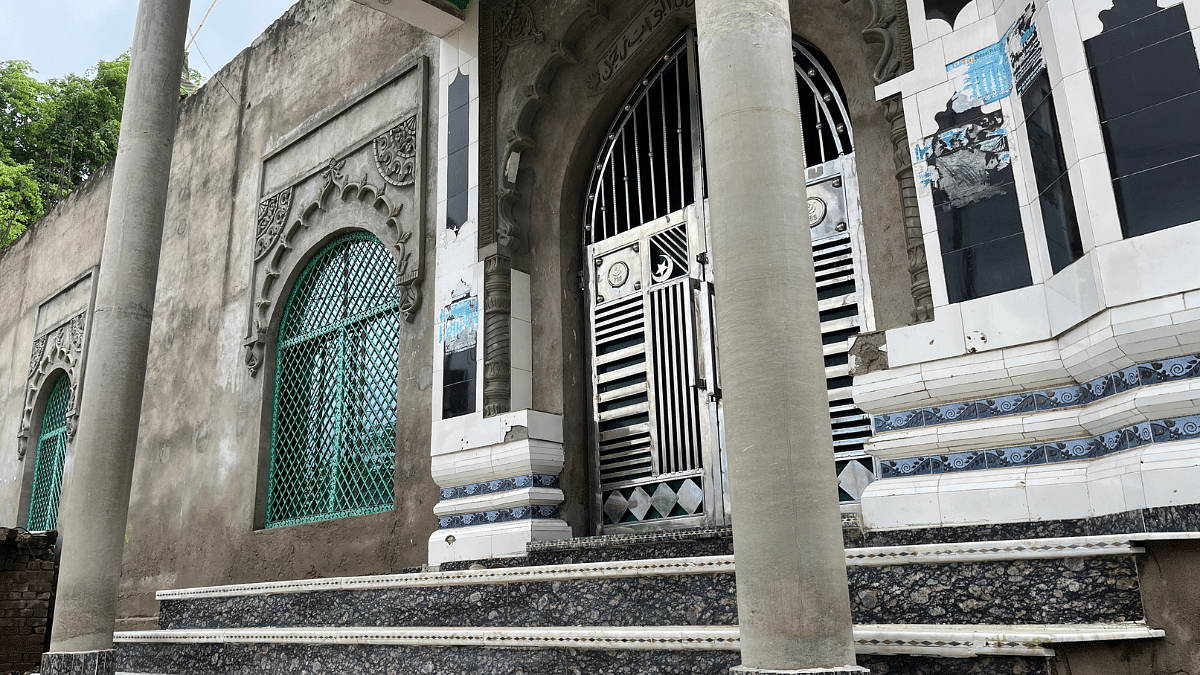 The gate of the madrasa at Saura village in UP's Fatehpur district where the child studied | Antara Baruah | ThePrint