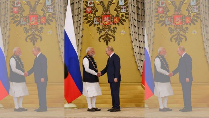 Prime Minister Narendra Modi being conferred the highest civilian award of Russian Federation, Order of St Andrew the Apostle, by Russian President Vladimir Putin, in Moscow, Russia on 9 July | PTI Photo