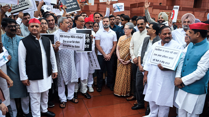 Congress Parliamentary Party chairperson Sonia Gandhi, Leader of Opposition Rahul Gandhi and other INDIA bloc MPs protest alleging discrimination in the Union Budget at Parliament in New Delhi on Wednesday | ANI