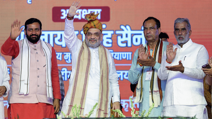 File photo of Union Home Minister Amit Shah and Haryana Chief Minister Nayab Singh Saini (left) during the 'Backward Class Samman Sammelan' in Mahendragarh | ANI