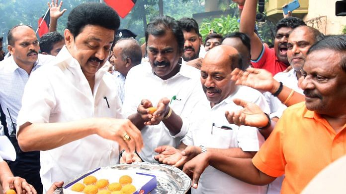 Tamil Nadu CM and DMK chief MK Stalin distributing sweets at party HQ in Chennai, Friday, after party's victory in Vikravandi bypoll | ANI