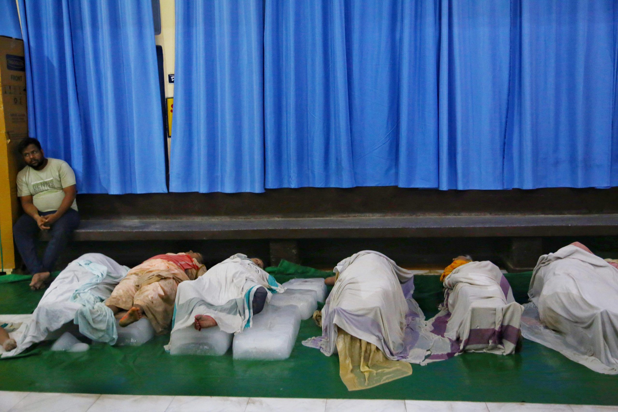 Stampede victims laid on ice slabs at the Bagla Combined Hospital, Hathras | Manisha Mondel | ThePrint