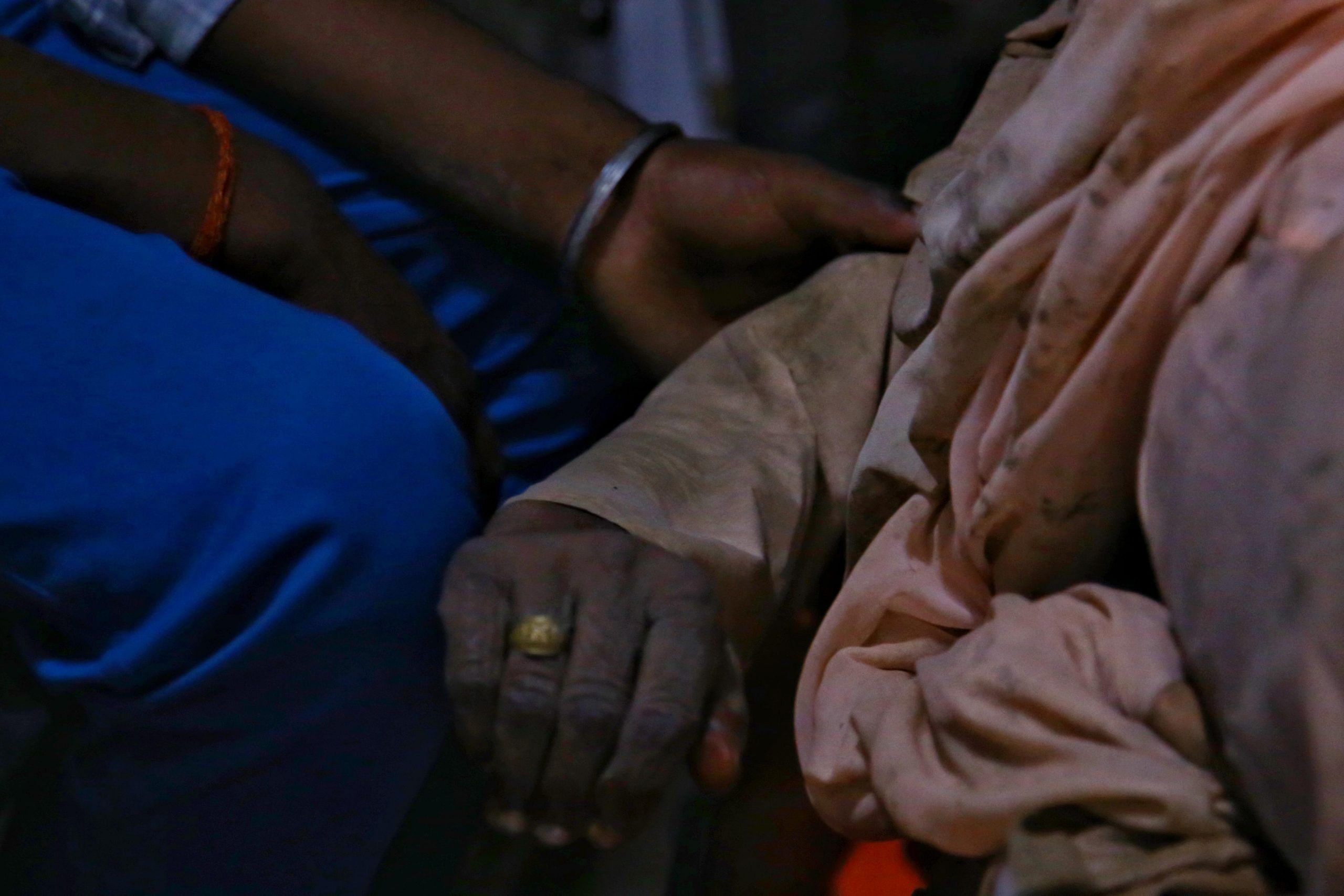 Stampede victim holding hands | Manisha Mondel | ThePrint