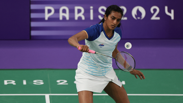 Women's Singles Group play stage - Porte de La Chapelle Arena, Paris, France - July 28, 2024. V. Sindhu Pusarla of India in action during the Group M match against Fathimath Nabaaha Abdul Razzaq of Maldives. REUTERS/Hamad I Mohammed