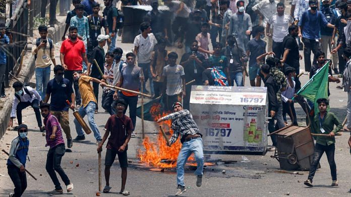 Anti-quota supporters clash with police and Awami League supporters at the Rampura area in Dhaka, Bangladesh, July 18, 2024 | Reuters