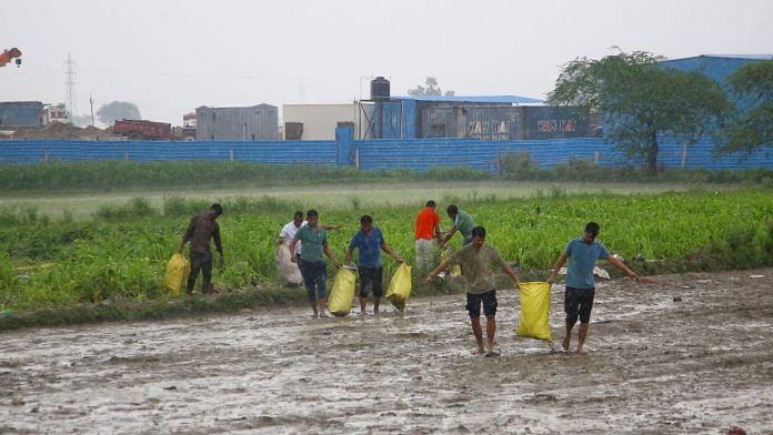 Bags full of belongings of people— shoes, clothes and more packed from the stampede scene and uploaded on a tempo | ThePrint | Manisha Mondal