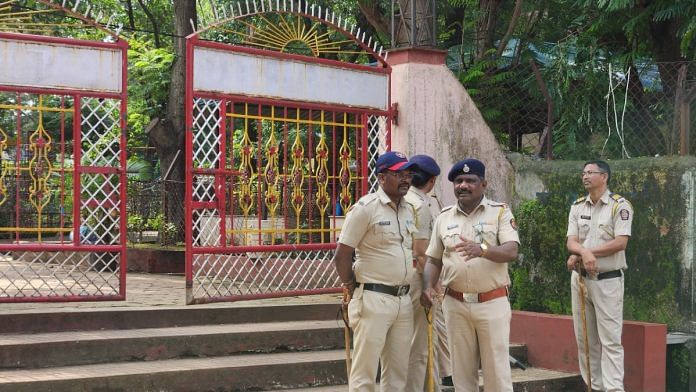 Police officers stand guard outside a private school Wednesday in Badlapur, Thane district, where two minor were allegedly sexually assaulted. | Purva Chitnis | ThePrint