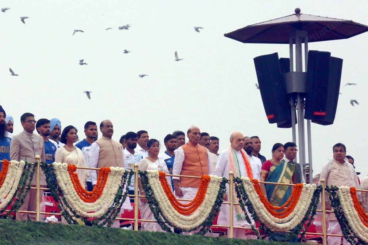 (Left to Right) CJI D.Y. Chandrachud, Lok Sabha Speaker Om Birla, and Home Minister Amit Shah along with their wife during National Anthem at Red Fort | Praveen Jain | ThePrint