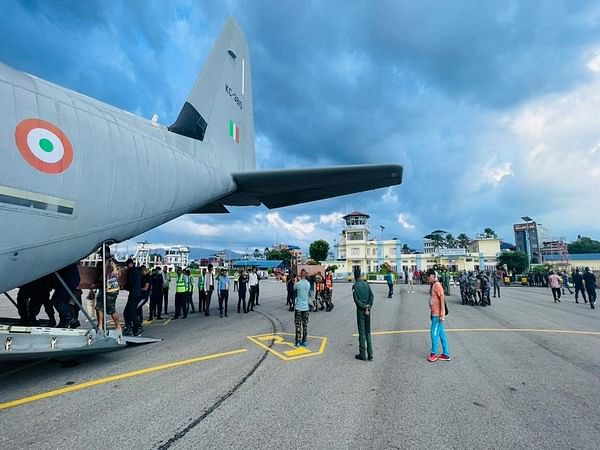 IAF aircraft carrying mortal remains of 25 Indian pilgrims killed in Nepal lands at Jalgaon Airport 