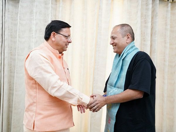 Vipul Amrutlal Shah meets Uttarakhand CM Pushkar Singh Dhami at his residence 