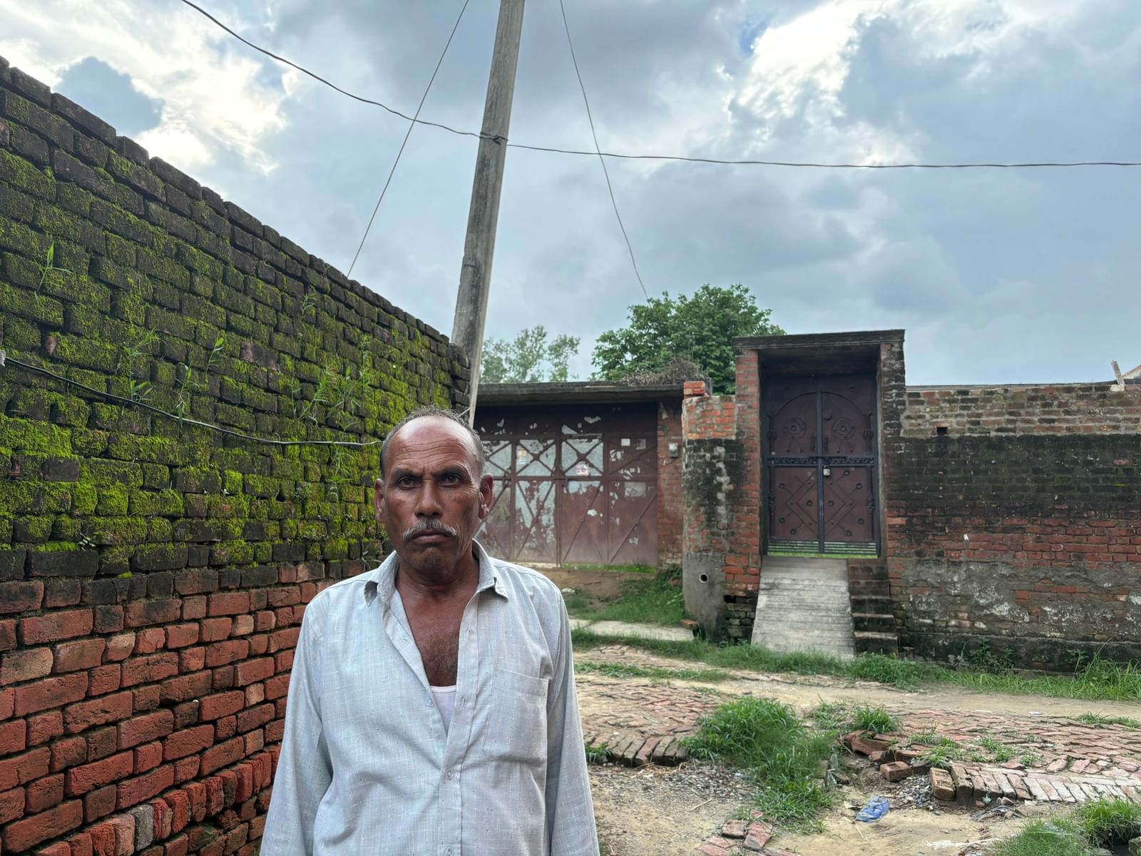 Kuldeep’s father Baburam outside their house in Bakarganj | Bismee Taskin | ThePrint
