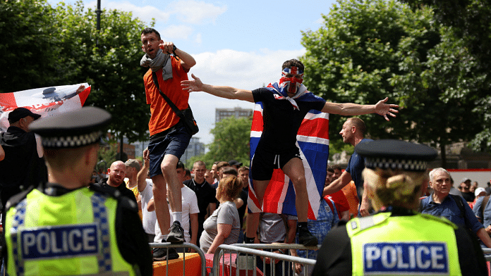 Demonstrators attend a protest against illegal immigration, in Leeds, Britain, 3 August, 2024 | Credit: Reuters/Hollie Adams