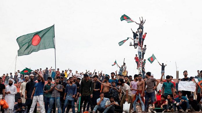 People celebrate the resignation of PM Sheikh Hasina in Dhaka | Photo: REUTERS/Mohammad Ponir Hossain