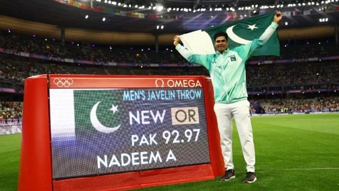 Javelin thrower Arshad Nadeem celebrates after clinching gold for Pakistan at the 2024 Paris Olympics | Photo: Reuters