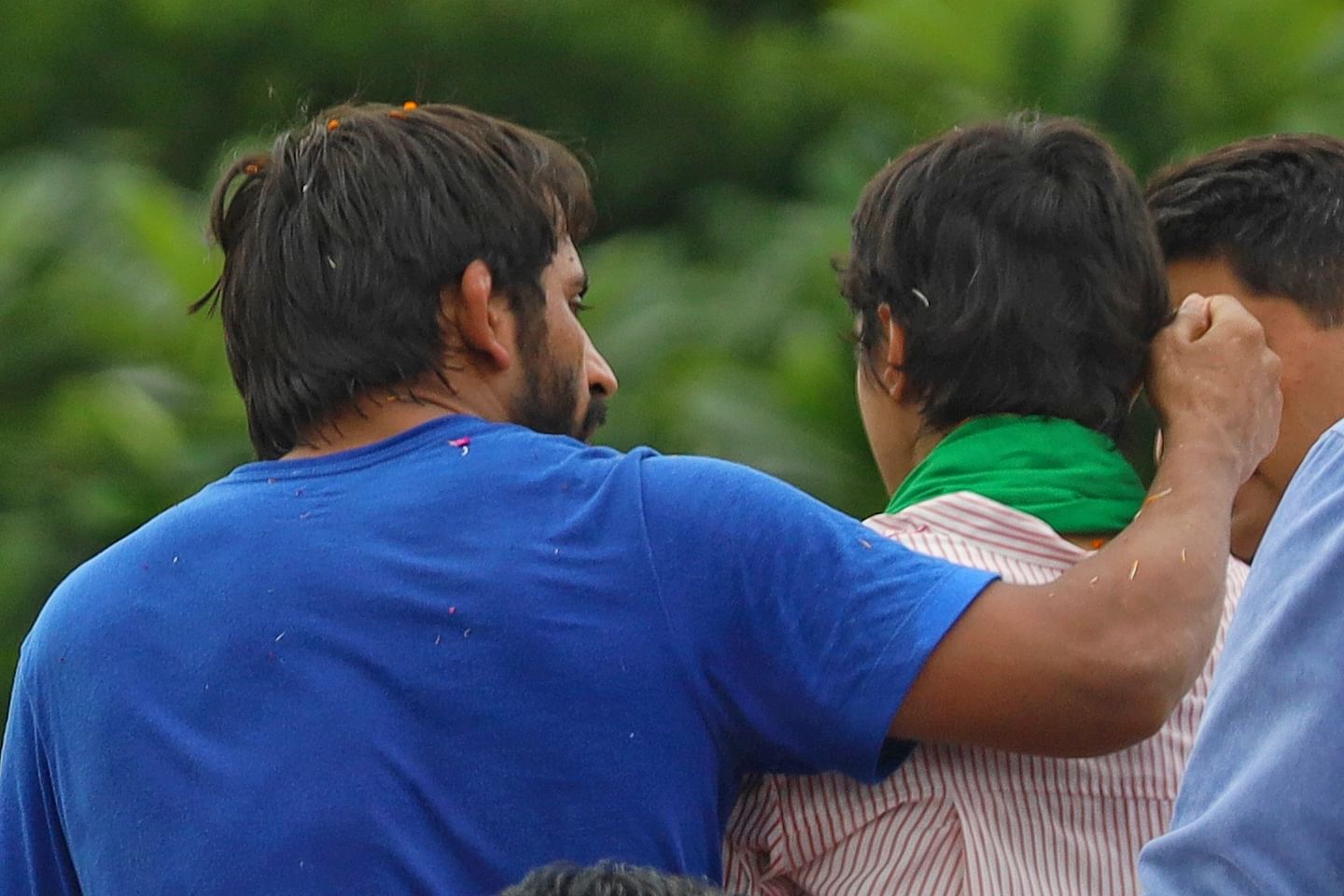 Wrestler Bajrang Punia comforts sad Vinesh Phogat| Photo: Manisha Mondal | ThePrint