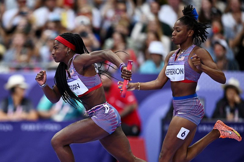 OlympicsAthleticsUS women lead way into sprint relay final as Jamaica