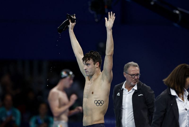 Olympics-Swimming-Finke breaks world record to win men's 1,500m ...