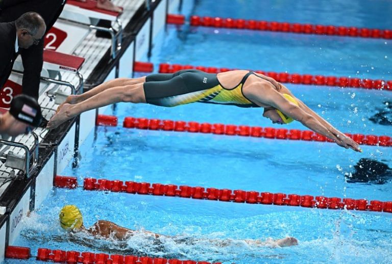 OlympicsTriumphant Australian team return home with record gold medal