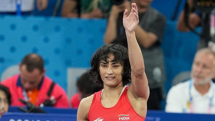 Vinesh Phogat celebrates after winning her Women's Freestyle 50kg semi-final wrestling match against Cuba's Yusneylys Guzman Lopez at the 2024 Summer Olympics, in Paris, France on Tuesday, Aug 6 | PTI Photo/Ravi Choudhary