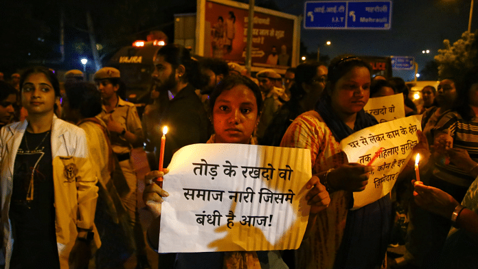 Reclaiming streets of Delhi, citizens and doctors came out on streets, outside AIIMS, CR Park, to protest against the TMC government and demanding justice for Kolkata victim | ThePrint photo by Manisha Mondal
