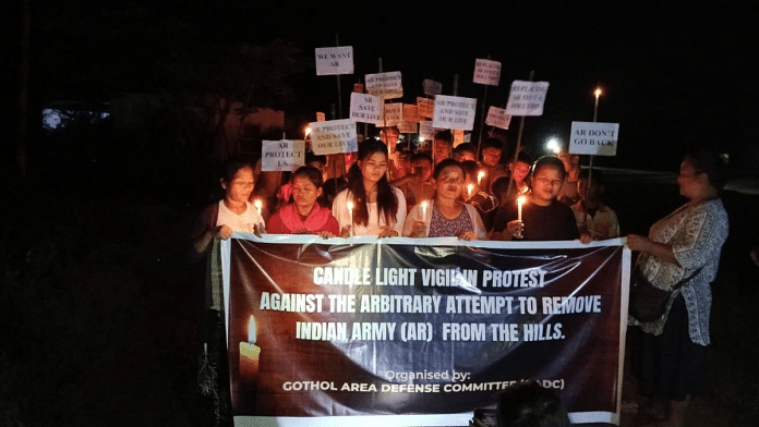 Local residents of Churachandpur led by the Kuki Students’ Organisation (KSO) at candlelight vigil on Wednesday evening | By Special Arrangement