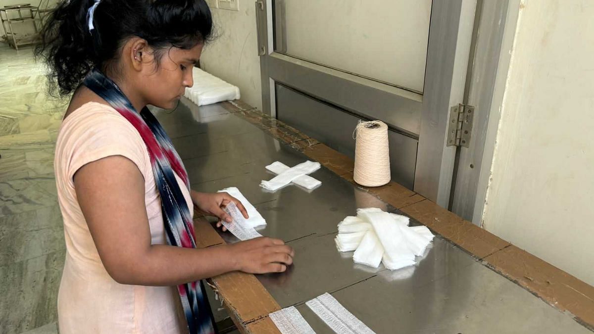 Woman cutting bandages | Vandana Menon, ThePrint