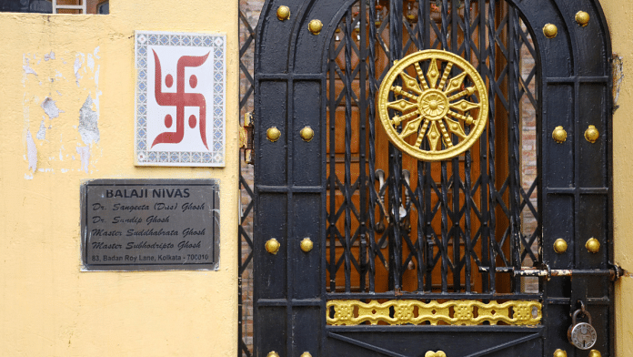 The locked entrance of the three-storey building of Sandip Ghosh, former principal of Kolkata's RG Kar Medical College and Hospita in Kolkata's Beliaghata | Manisha Mondal | ThePrint