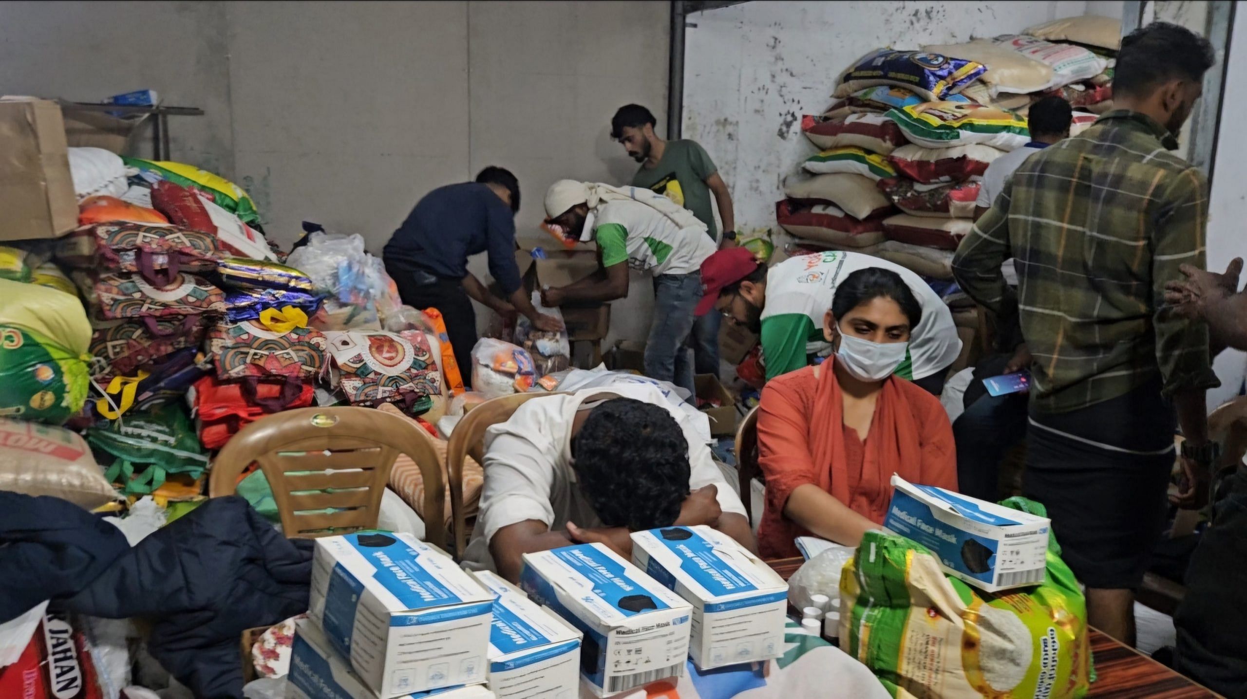 Volunteers oversee distribution of essential items among those impacted by the landslides | Aneesa PA | ThePrint