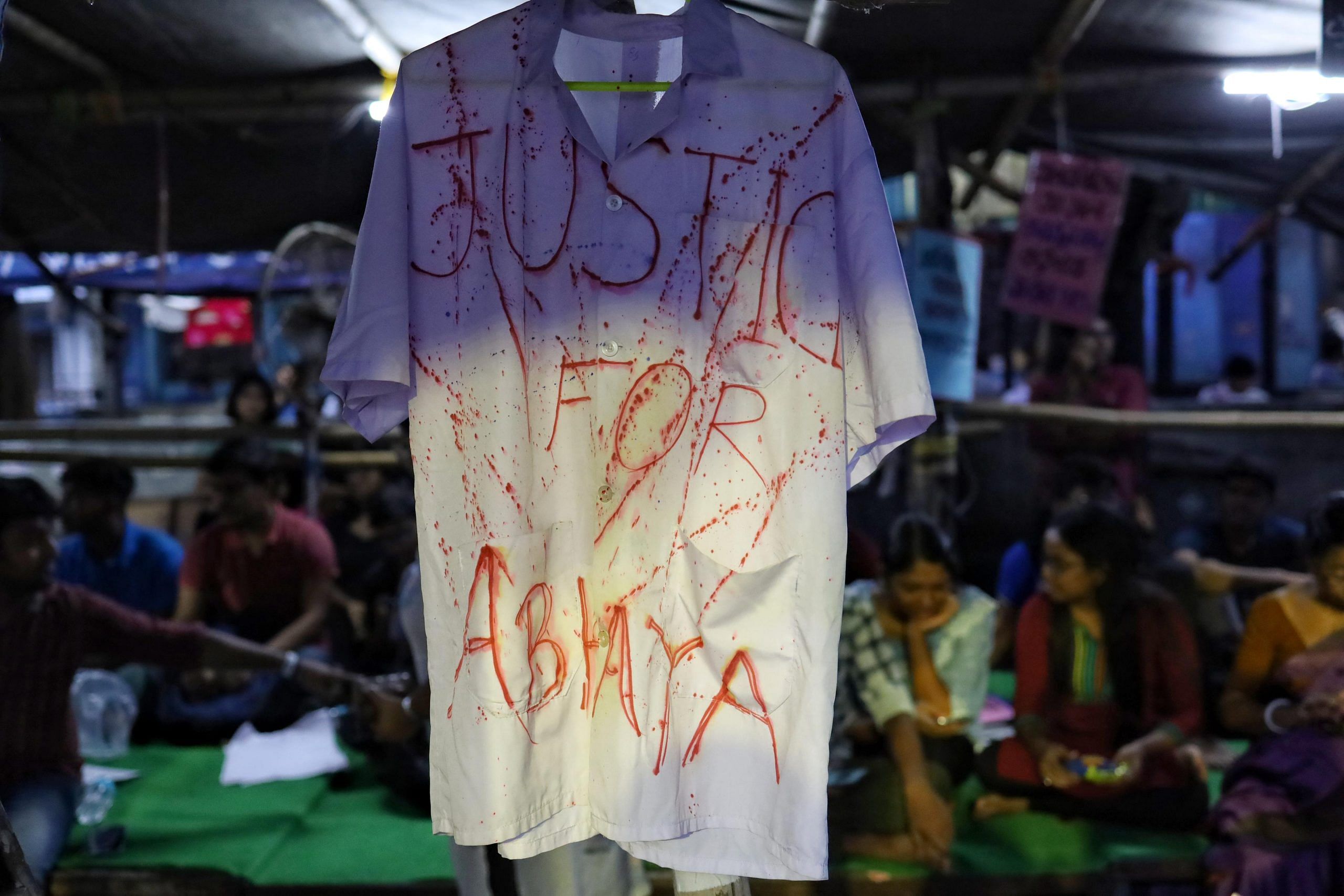 A doctors coat with “justice for Abhaya” written on it at the RG Kar protest site. | Manisha Mondal | ThePrint