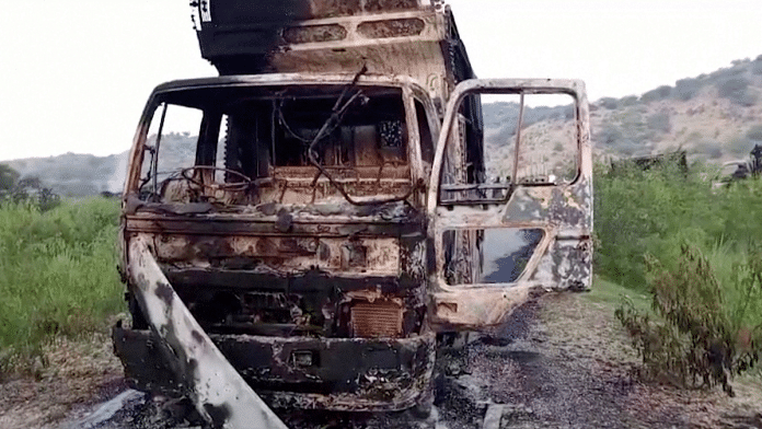 A view shows a charred vehicle, after separatist militants conducted deadly attacks, according to officials, in Balochistan province, Pakistan, August 26, 2024, in this screengrab obtained from a video. Reuters TV | Reuters