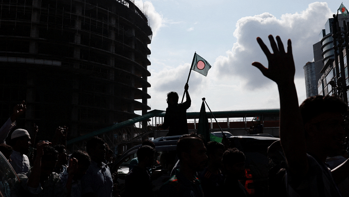 People celebrate the resignation of Bangladeshi Prime Minister Sheikh Hasina in Dhaka, Bangladesh | Reuters | Mohammad Ponir Hossain