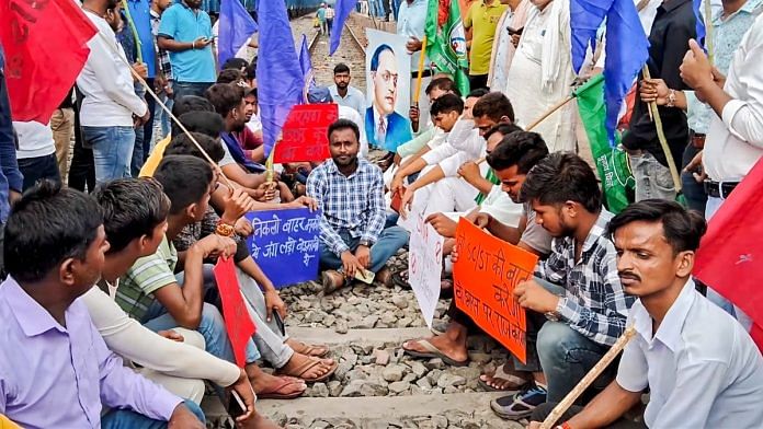 Bhim Army supporters block railway tracks in support of the Bharat Bandh call over the recent Supreme Court ruling on SC/ST reservations, in Arrah, Thursday, Aug. 21, 2024 | PTI