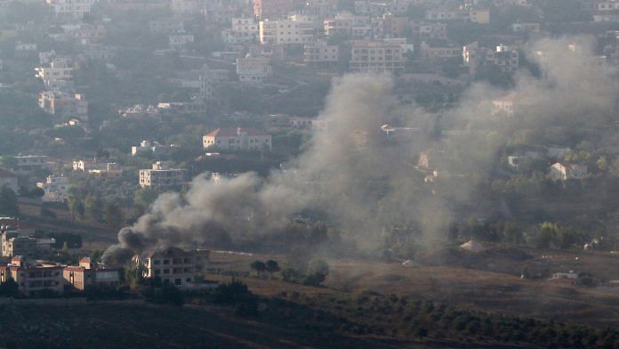 Smoke rises from the southern Lebanese town of Khiam, amid ongoing cross-border hostilities between Hezbollah and Israeli forces, as pictured from Marjayoun, near the border with Israel, August 25, 2024 | Reuters