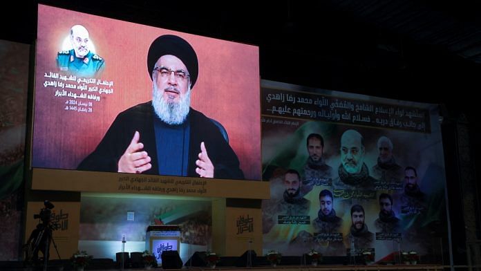 Lebanon's Hezbollah leader Sayyed Hassan Nasrallah gives a televised address to mark one week since a suspected Israeli strike on Iran's consulate in Damascus that killed several Iranian Quds Force figures, including a top commander, in Beirut's southern suburbs, Lebanon April 8, 2024 | Reuters file photo