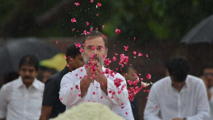 Congress leader Rahul Gandhi pays floral tribute to former Prime Minister Rajiv Gandhi on his 80th birth anniversary, at Veer Bhumi | Photo: Suraj Singh Bisht | ThePrint