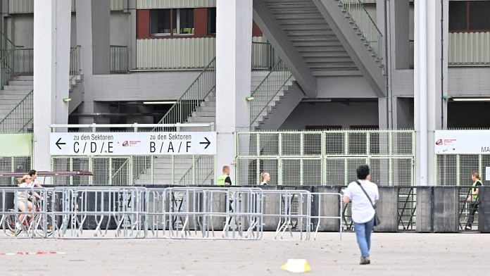 People and security walk outside Happel stadium after Taylor Swift's three concerts this week were canceled after the government confirmed a planned attack at the stadium in Vienna, Austria, August 8, 2024 | Reuters